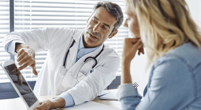 Doctor explaining to patient